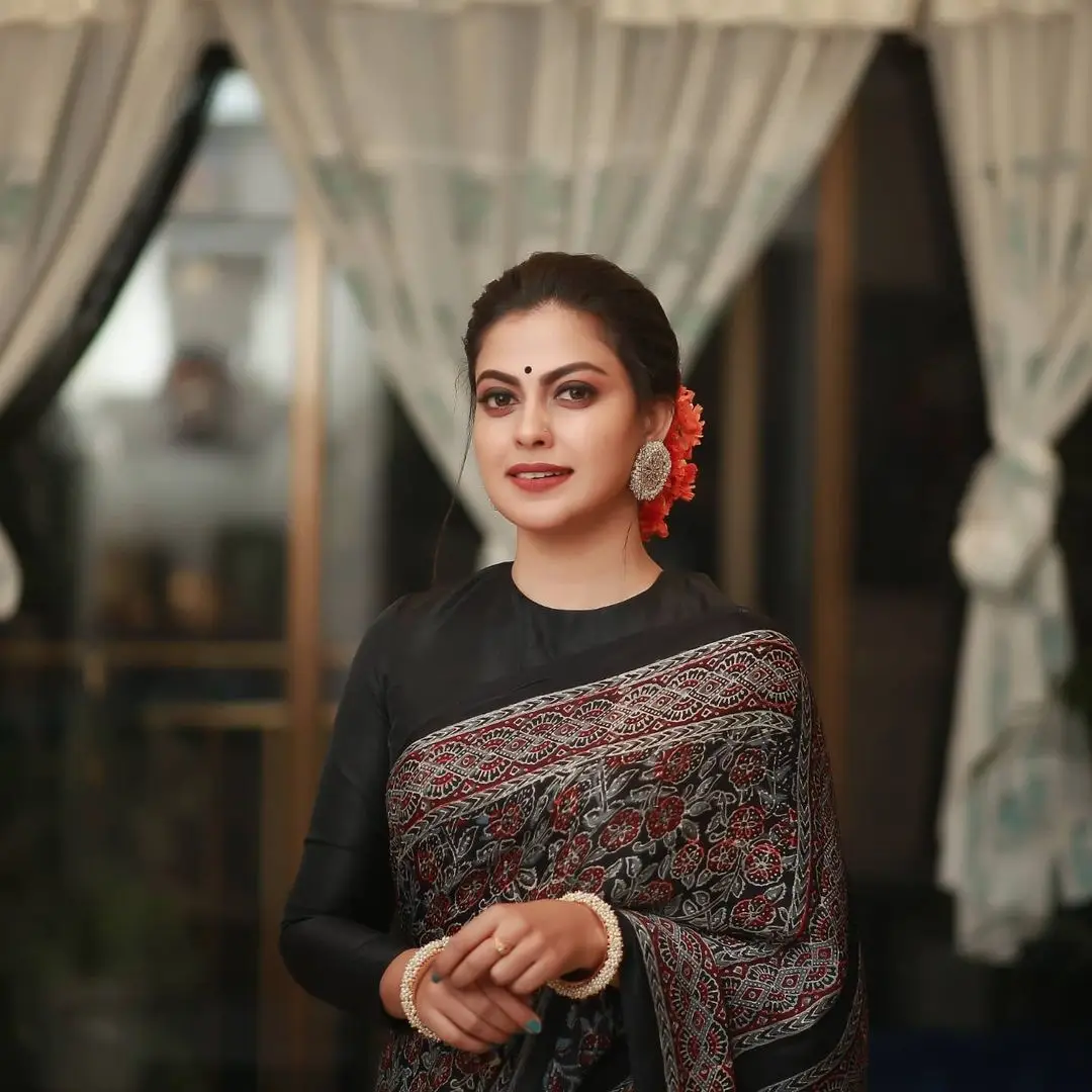 Anusree Nair Wearing Beautiful Earrings Jewellery Black Saree Blouse